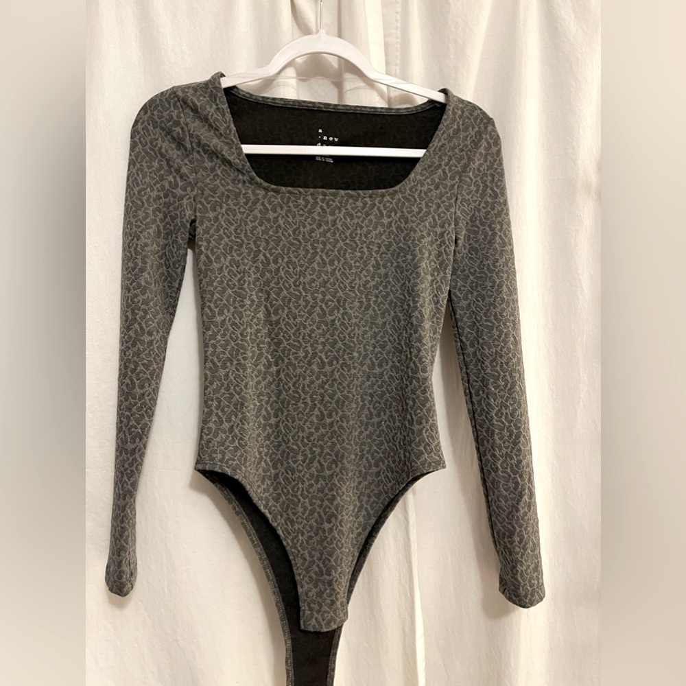 Leopard print body suit
